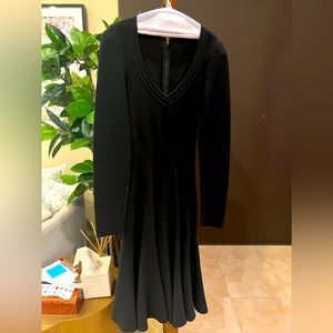 Long Sleeve Black Midi cocktail dress from Alaia.  Size 38.